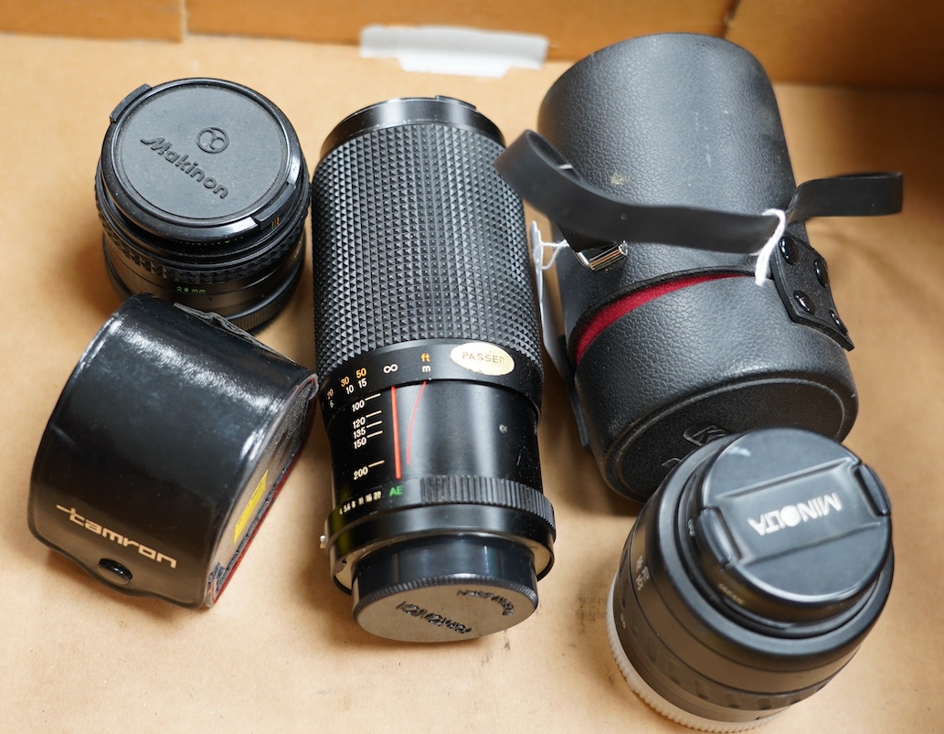 Five photography accessories including; two Konica lenses, a Minolta lens, a Makinon lens and a Tamron auto tele converter 2x K-EE. Condition - fair to good